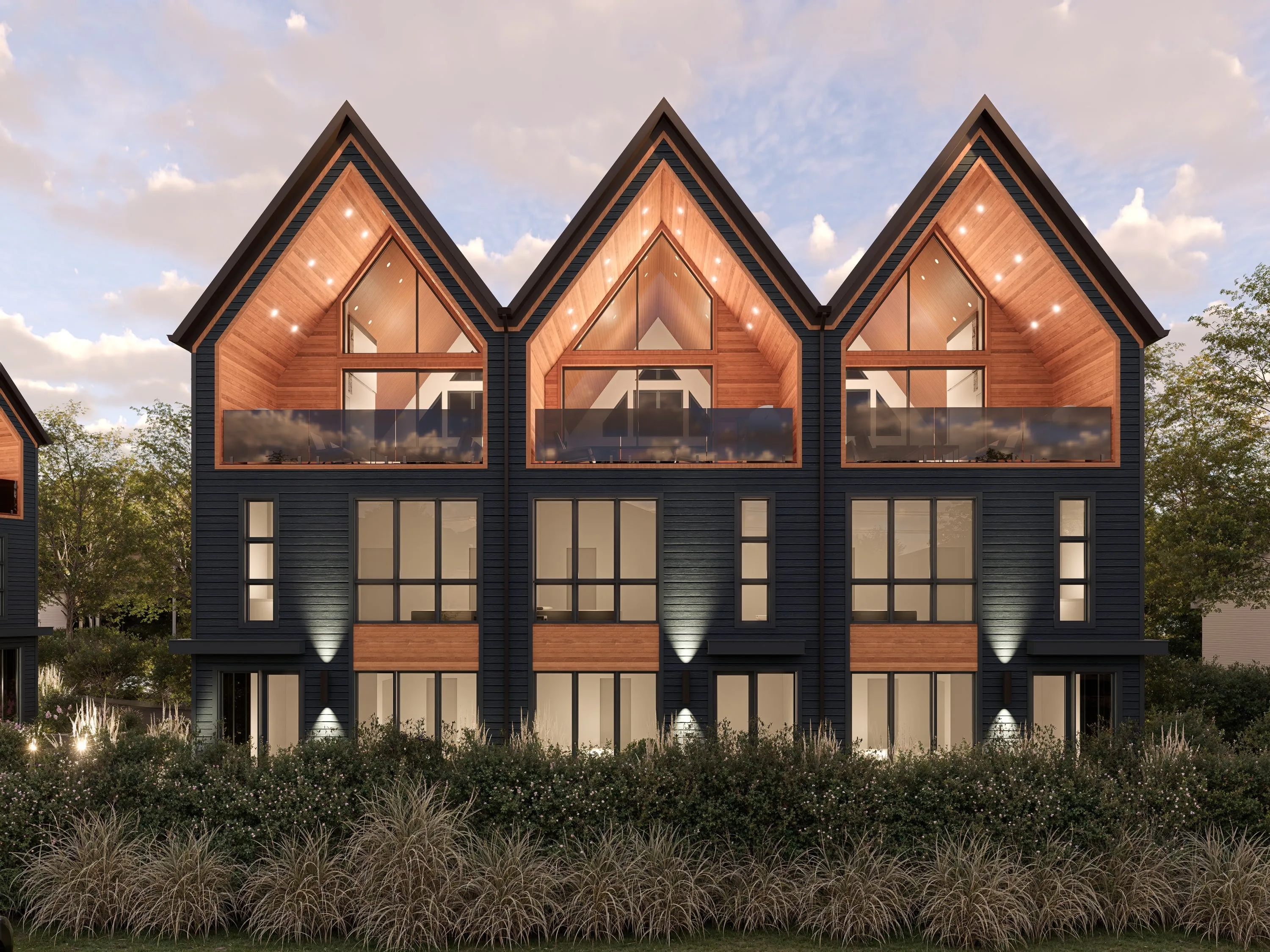 Design rendering of a row of dark gabled residences from the garden side.